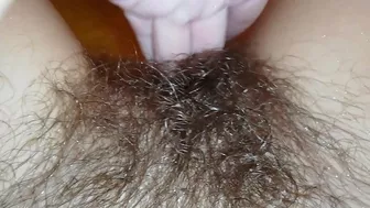 Gal records herself caressing her super-hairy bush in the bathroom