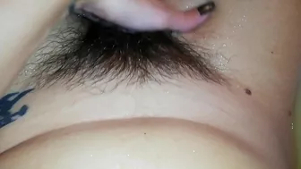 Gal records herself caressing her super-hairy bush in the bathroom