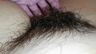 Gal records herself caressing her super-hairy bush in the bathroom