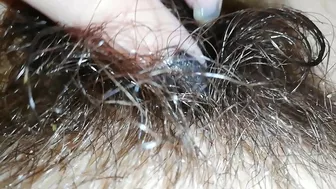 Gal records herself caressing her super-hairy bush in the bathroom