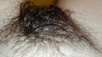 Gal records herself caressing her super-hairy bush in the bathroom