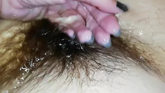 Gal records herself caressing her super-hairy bush in the bathroom