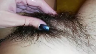Gal records herself caressing her super-hairy bush in the bathroom