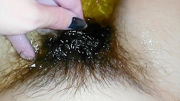 Gal records herself caressing her super-hairy bush in the bathroom