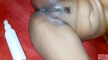 Sister uses a bottle of lotion as dildo for Indian brother to watch