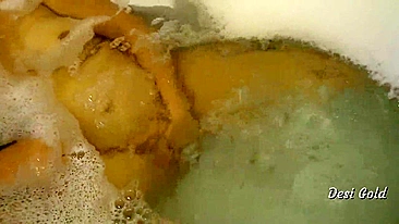 Bhabhi possessor of saggy titties goes bathing to masturbate in water