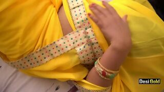 Porn of the Bhabhi amateur model in yellow boasting about hot titties