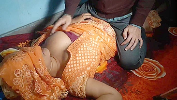 Charming Bhabhi in orange sari does Indian porn with her horny devar