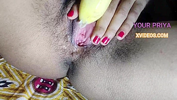 Super-horny Indian Bhabhi masturbates hairy desi pussy with a banana