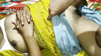 Bhabhi in yellow sari opens pussy to give sexual joy to Indian lover