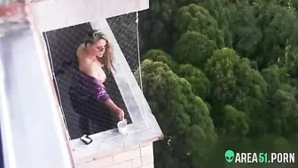Spying on my neighbor getting horny in her balcony