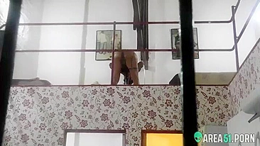 Spying on the new neighbor, his wife nude masturbating in the balcony
