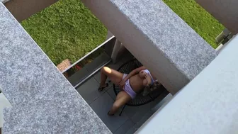 Spying on the neighbor, his bride misses  and masturbating in the balcony