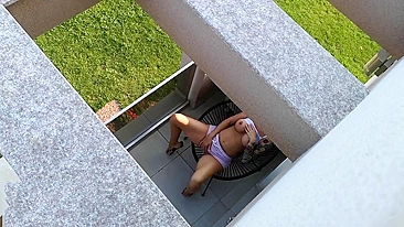 Spying on the neighbor, his bride misses  and masturbating in the balcony