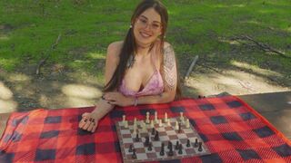 Pig-tailed chess player with glasses initiates XXX game outdoors