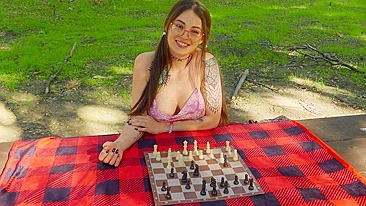 Pig-tailed chess player with glasses initiates XXX game outdoors