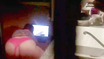 Voyeur stays near window and catches mom masturbating and watching porn