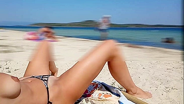 Amateur kinky wife flashing pussy and masturbate on the public beach