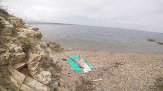 At the public beach this kinky wife masturbate and caught on cam