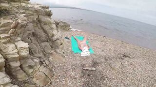 At the public beach this kinky wife masturbate and caught on cam