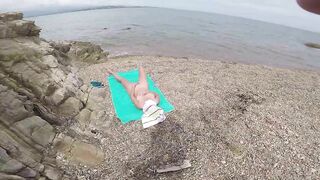 At the public beach this kinky wife masturbate and caught on cam