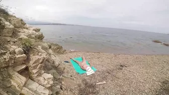 At the public beach this kinky wife masturbate and caught on cam