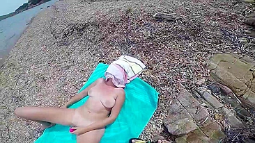 At the public beach this kinky wife masturbate and caught on cam