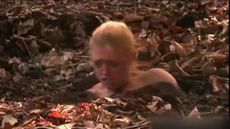 Busty MILF enjoys BDSM humiliation and nearly drowns in mud