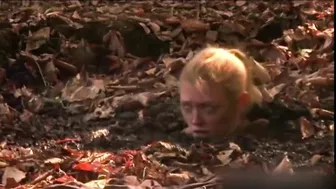 Busty MILF enjoys BDSM humiliation and nearly drowns in mud