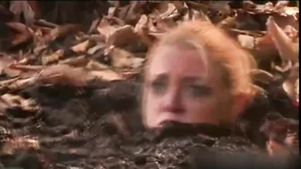 Busty MILF enjoys BDSM humiliation and nearly drowns in mud