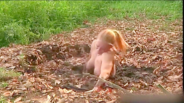 Busty MILF enjoys BDSM humiliation and nearly drowns in mud