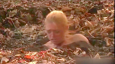 Busty MILF enjoys BDSM humiliation and nearly drowns in mud