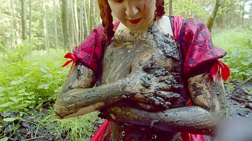 Slutty red riding hood masturbates in forest mud