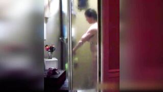 I caught my mom masturbating in the bathroom with the shower head
