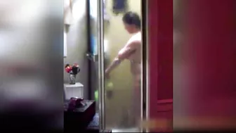 I caught my mom masturbating in the bathroom with the shower head