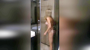 Hidden cam caught mommy using a shower head to masturbate