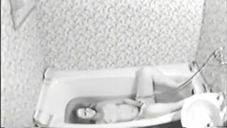 A spy camera caught a 19 yo sister masturbate pussy with a stream of water