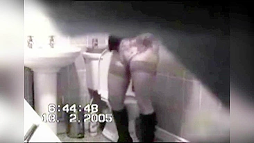 A spy camera caught a colleague masturbating in the public bathroom