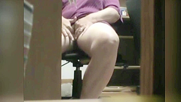 Excited BBW sits by table and gets caught masturbating on hidden cam
