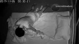 Short-haired wife caught masturbating in the midnight using pillow