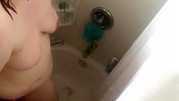 Curvy sister caught masturbating while relaxing solo in shower