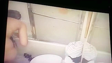 Insatiable wife caught masturbating on hidden cam installed in bath