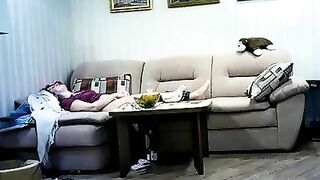 Mom is caught masturbating on the couch to sounds of Game of Thrones