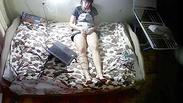 Mature married mom is caught masturbating to porn on her laptop in bed