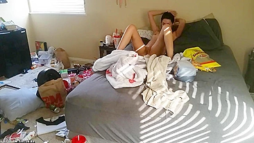 Attractive brunette sister caught masturbating in her untidy room