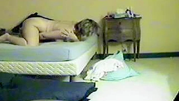 Amateur mom is tempted and caught masturbating on all fours in bed