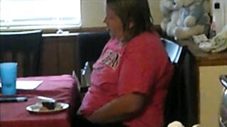 Fat mom caught sneakily masturbating while sitting near kitchen table