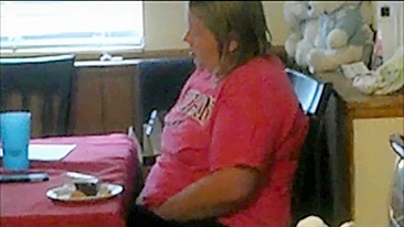Fat mom caught sneakily masturbating while sitting near kitchen table