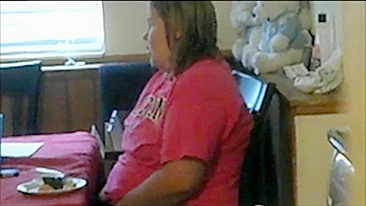 Fat mom caught sneakily masturbating while sitting near kitchen table