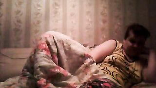 Mature mom caught sneakily masturbating under blanket on the sofa